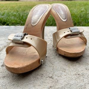 Bebe Stiletto Wood Sandals, Gold Size 7